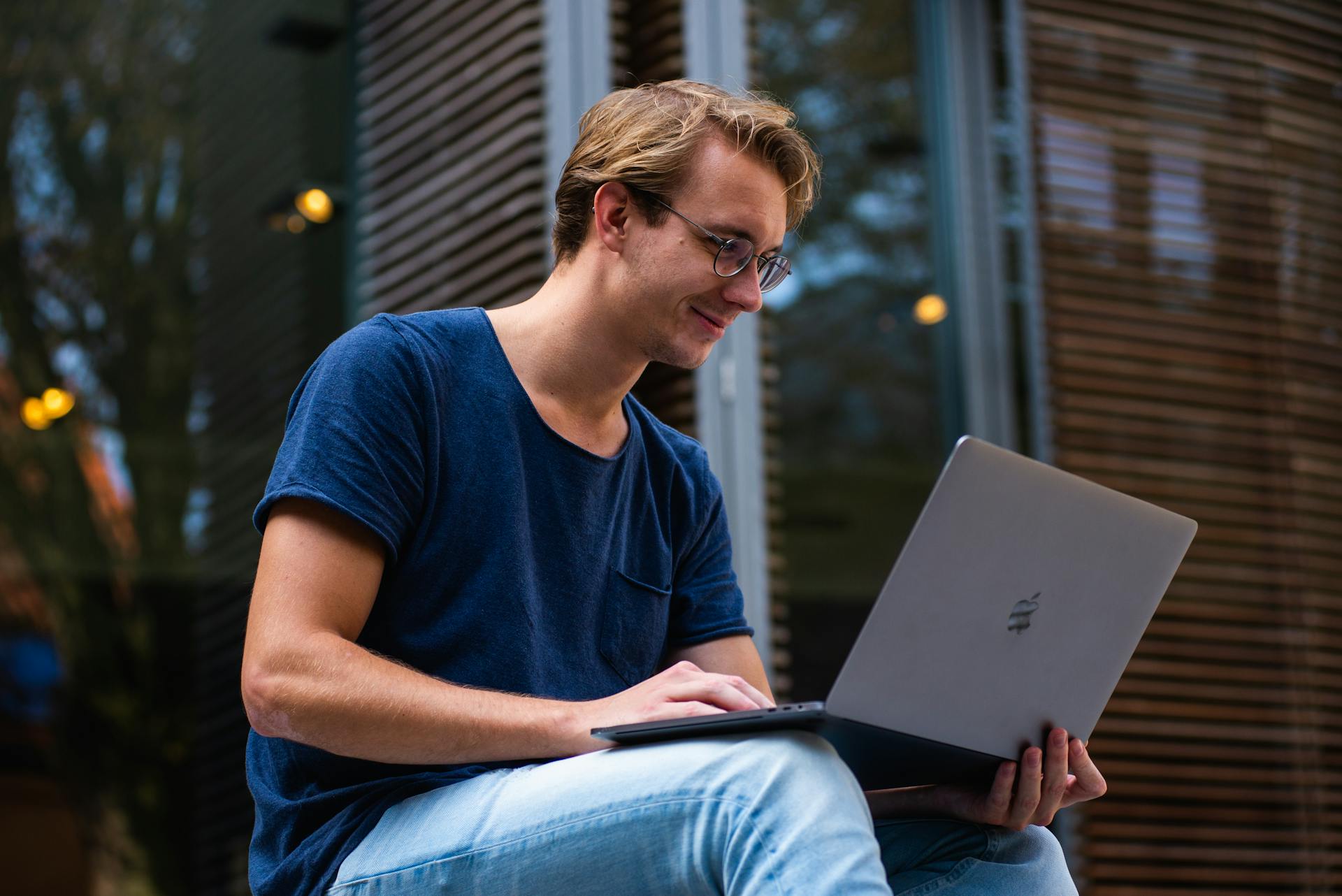 Man smiling while filing for bankruptcy.